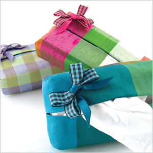 plaid silk tissue case shown in violet, party pink, and exotic green